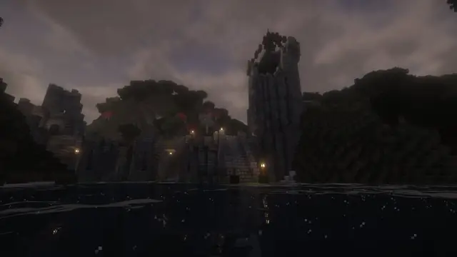The Broken Bridge: a collapsed stone bridge and its tower over dark water at night.