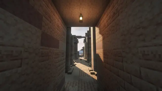 The Hall of Fallen Columns: a sandstone passage opening onto rows of broken columns.