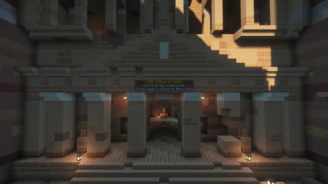 The Carved Tomb: a pillared tomb front cut into a canyon wall, lit by lanterns.